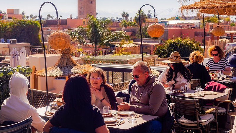 Watch Sunset from a Rooftop Café